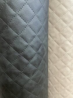 Tikattu keinonahka Musta